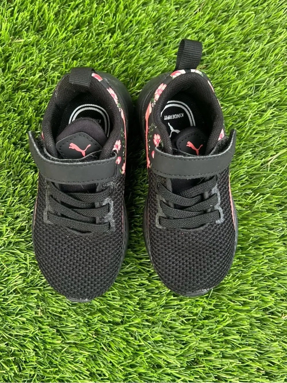 Puma Kids Black Sneakers with Pink Floral Accent